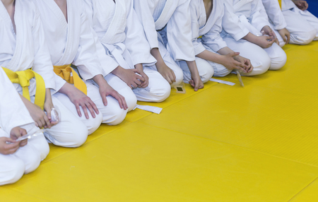 Group of children in kimono sitting on tatamiの写真素材