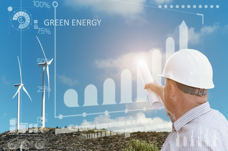 Engineer and a windfarmの写真素材