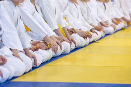 Group of children in kimono sitting on tatamiの写真素材