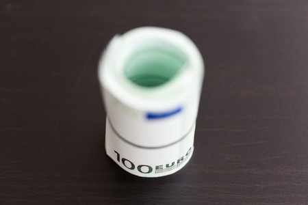 Roll of one hundred euro billsの写真素材