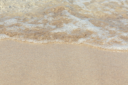 Soft wave of the sea on the beachの写真素材