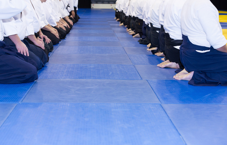 People in kimono and hakama on martial arts trainingの写真素材