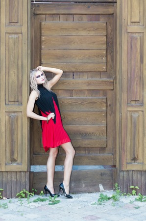 A fashion gothic style portrait of a beautiful blonde girlの写真素材