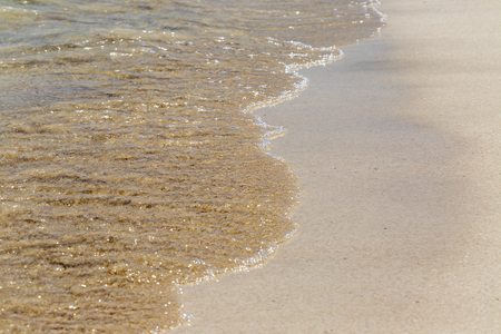 Soft wave of the sea on the beachの写真素材