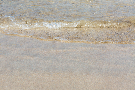 Soft wave of the sea on the beachの写真素材
