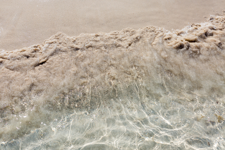 Soft wave of the sea on the beachの写真素材