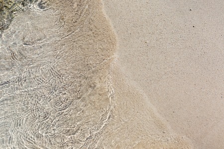 Soft wave of the sea on the beachの写真素材