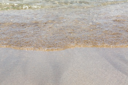 Soft wave of the sea on the beachの写真素材