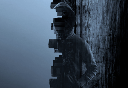 Suspicious man in hoodyの写真素材