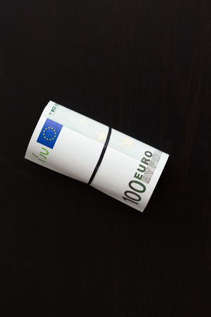 Roll of one hundred euro billsの写真素材