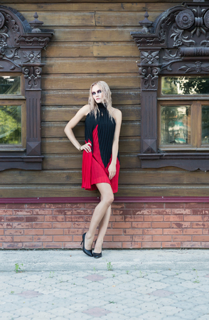 A fashion gothic style portrait of a beautiful blonde girlの写真素材