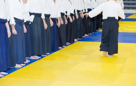 People in kimono and hakama on martial arts trainingの写真素材