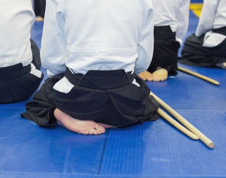 People in kimono on martial arts weapon training seminarの写真素材