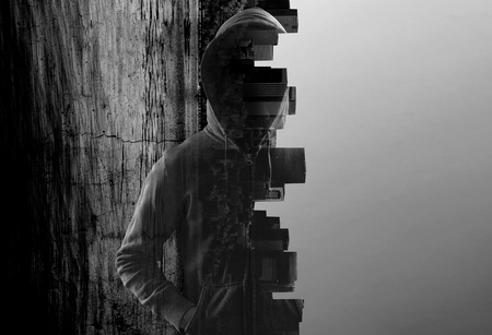 Suspicious man in hoodyの写真素材
