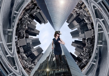 Woman wearing a virtual reality headsetの写真素材