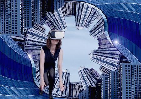 Woman wearing a virtual reality headsetの写真素材
