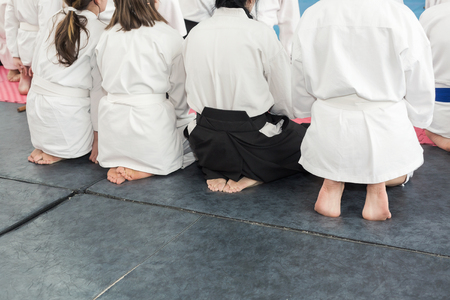 People in kimono and hakama on martial arts trainingの写真素材