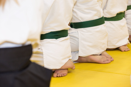 People in kimono and hakama on martial arts trainingの写真素材