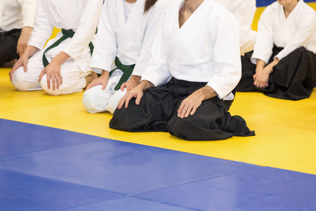 People in kimono and hakama on martial arts trainingの写真素材
