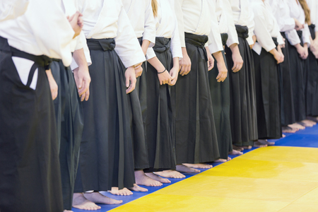 People in kimono and hakama on martial arts trainingの写真素材