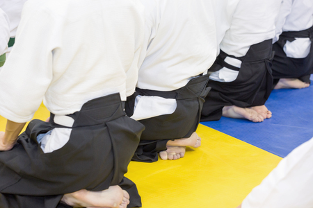 People in kimono and hakama on martial arts trainingの写真素材