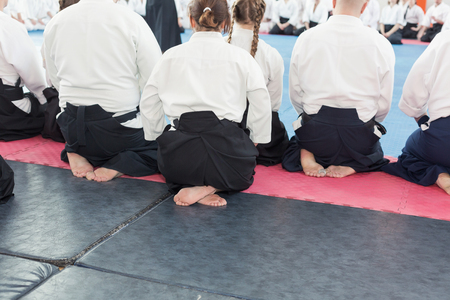 People in kimono and hakama on martial arts trainingの写真素材