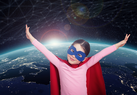 Superhero kid against the Earth.の写真素材