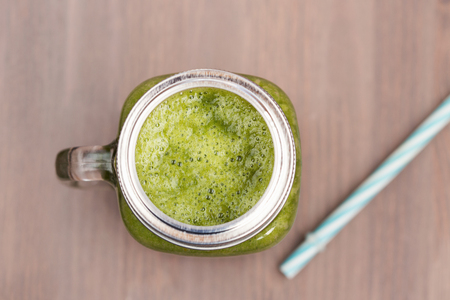 A green smoothie in a mason jarの写真素材