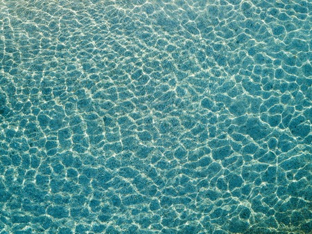 Aerial view of water reflections on the sea. Transparent waterの写真素材