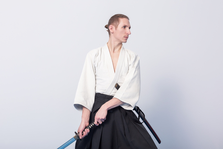A man with katana on Iaido practiceの写真素材