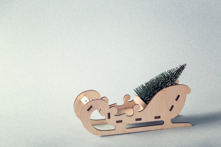 A sleigh that carry the Christmas treeの写真素材