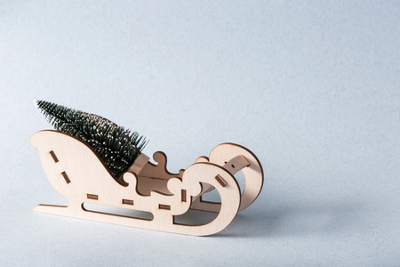 A sleigh that carry the Christmas treeの写真素材