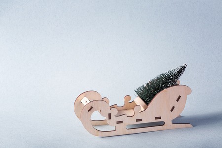 A sleigh that carry the Christmas treeの写真素材