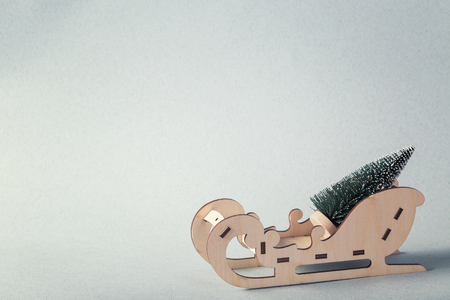 A sleigh that carry the Christmas treeの写真素材