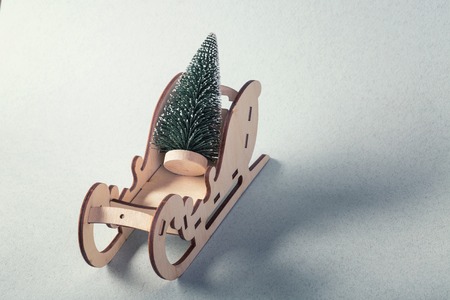A sleigh that carry the Christmas treeの写真素材