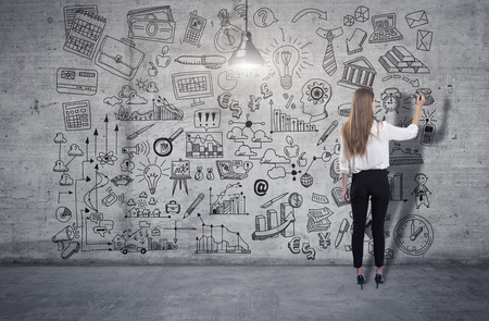 Young woman drawing a business sketch. 3d render elements in collageの写真素材