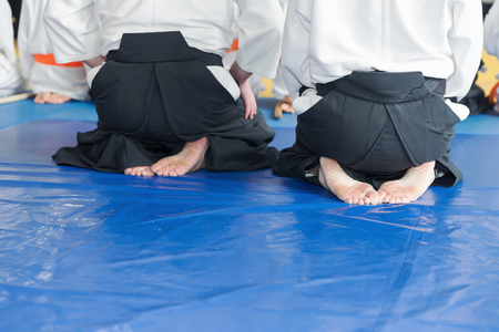 People in kimono and hakama on martial arts trainingの写真素材