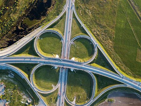Summer aerial photo of transport junction, traffic cross road junction day view from aboveの写真素材