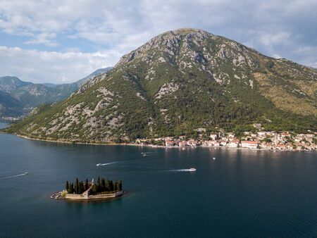 Aerial photo of St. George and monastery on the islands near Perast town in Kotor bayの写真素材