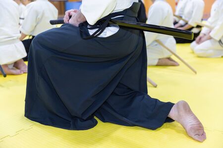 People in kimono on martial arts weapon training seminarの写真素材