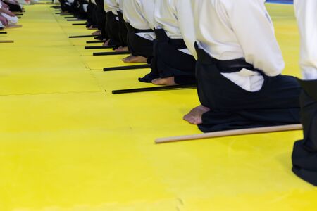 People in kimono on martial arts weapon training seminarの写真素材