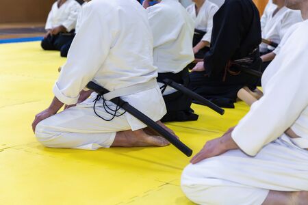People in kimono on martial arts weapon training seminarの写真素材
