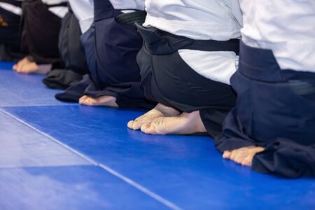 People in kimono and hakama on martial arts trainingの写真素材