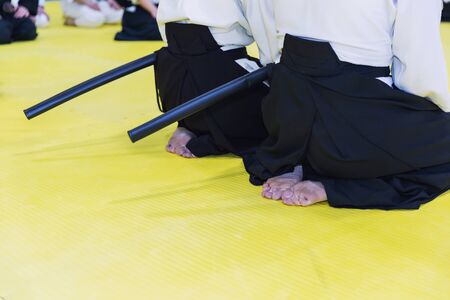 People in kimono on martial arts weapon training seminarの写真素材