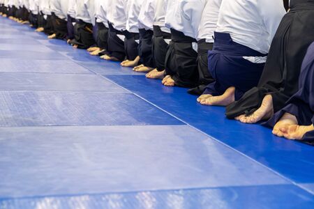 People in kimono and hakama on martial arts trainingの写真素材