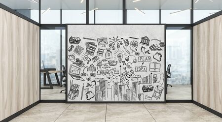A modern office with creative business strategy sketch drawn on white wallの写真素材