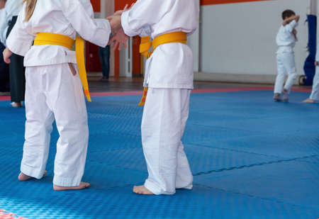 Children in kimono are training on tatamiの写真素材