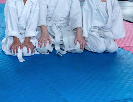 Children in kimono are sitting on tatamiの写真素材