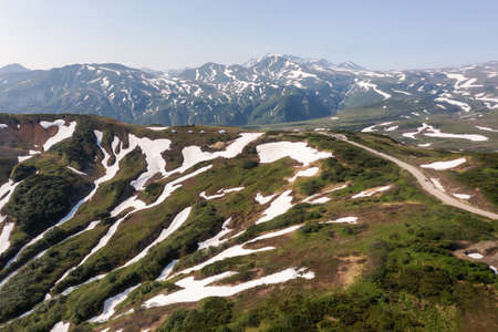 Beautiful mountain landscape of Vilyuchinsky Pass at sunny day. Kamchatka Peninsula, Russiaの写真素材