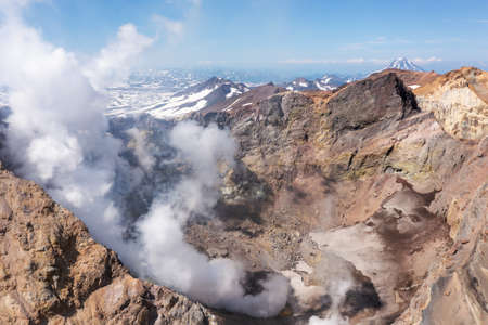 Aerial drone photo of Mutnovsky volcano crater with fumarolesの写真素材